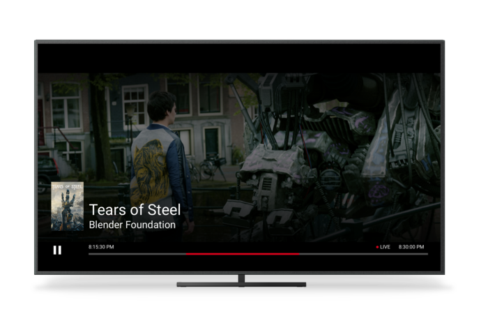 एक टीवी, जिसमें घड़ी के समय के हिसाब से, सातवीं स्क्रीन पर Chromecast का लाइव यूज़र इंटरफ़ेस (यूआई) दिख रहा है