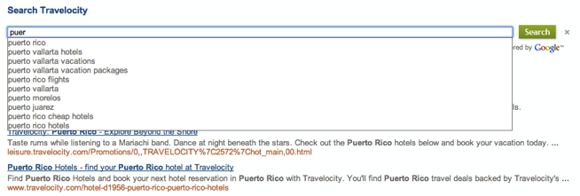 在可编程搜索引擎中为旅行网站输入“p-u-e-r”后，系统会弹出一个下拉列表，其中包含“波多黎各”、“巴亚尔塔港酒店”、“波多巴亚尔塔度假”等选项。