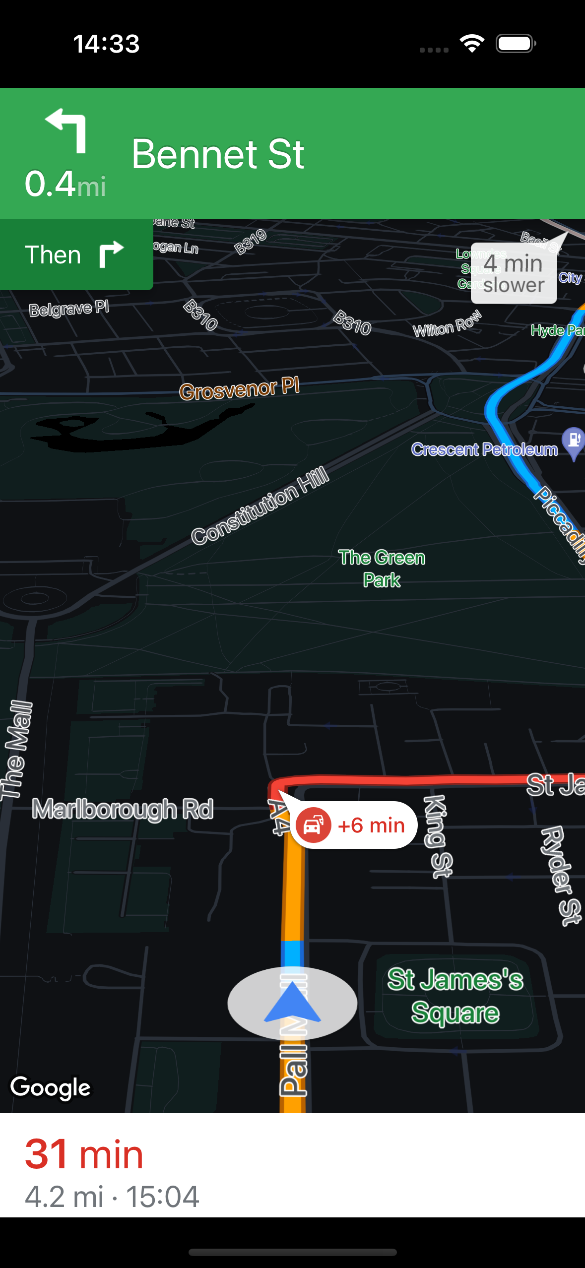 暗い色の地図スタイルの、iPhone 15 Pro で実行されている Navigation SDK のスクリーンショット。