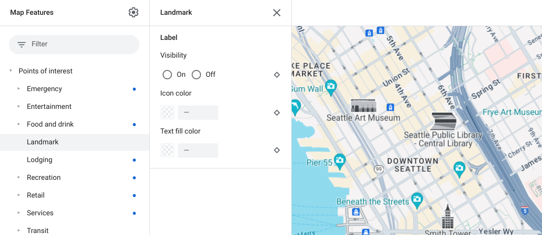 西雅圖市中心的地圖，有顯眼的搜尋點圖示和元素窗格，可用來切換顯示設定、圖示顏色和文字顏色。