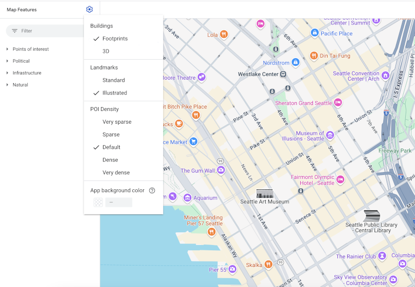 Mapa centrum Seattle z charakterystycznymi ikonami ważnych miejsc: małą, czarno-białą ilustracją liniową danego ważnego miejsca, taką jak Smith Tower. Znaczniki te mają około 2–3 razy większy rozmiar od standardowego znacznika ciekawego miejsca (łącznie z tłem).