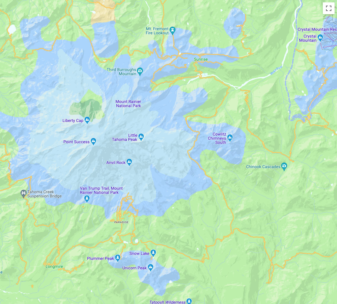 Wyraźna mapa z Mount Rainier w kolorze niebieskim otoczonym zielenią parku