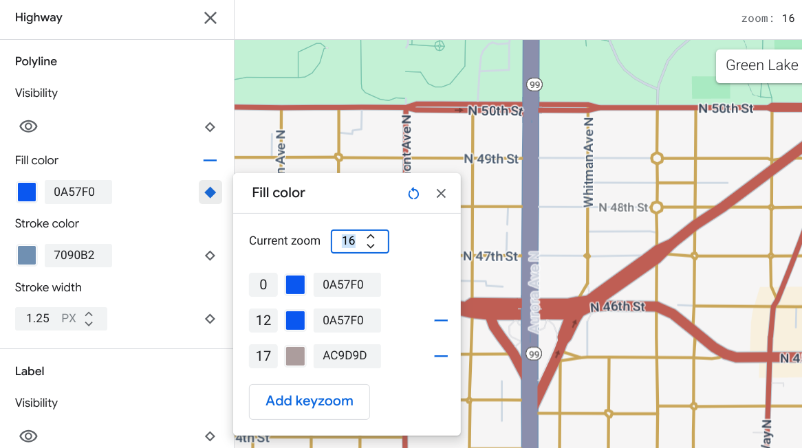 Dieselbe Karte von Seattle, aber mit Stilen für die Zoomstufen 12 und 17, sodass die Farben der blauen Autobahn in der beigefarbenen Oberfläche verblassen.