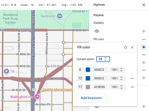 El mismo mapa de Seattle, pero con diseños de nivel de zoom agregados en los niveles 12 y 17 para que los colores de la autopista azul se desvanezcan en la superficie beige.