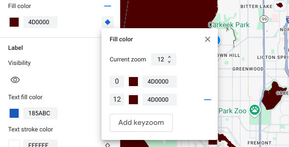 The fill color for the water element is set to dark red. In the zoom-level styling pane, the added keyzoom is also set to dark red.