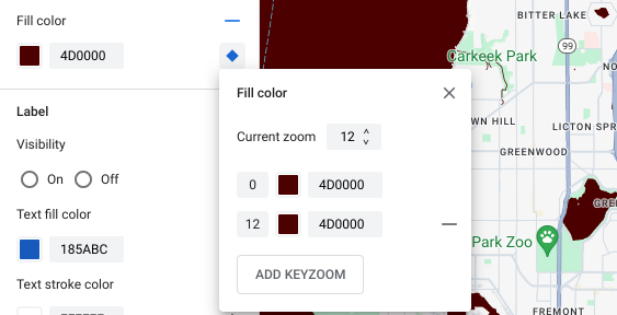 The fill color for the water element is set to dark red. In the zoom-level styling pane, the added keyzoom is also set to dark red.