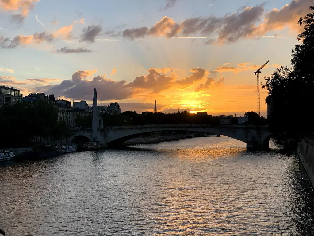 A photo of Paris near sunset. alt_text